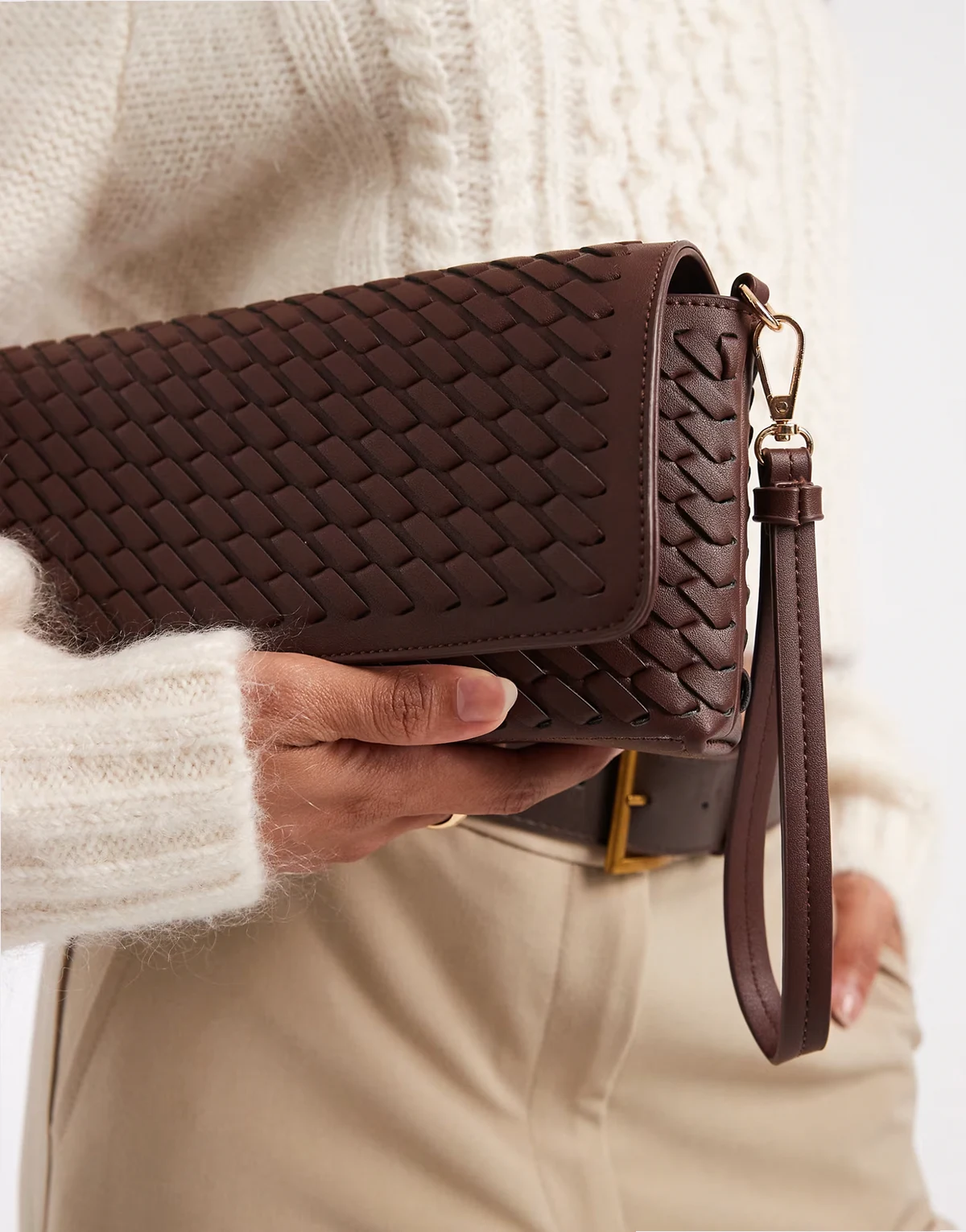 woven clutch bag in dark brown
