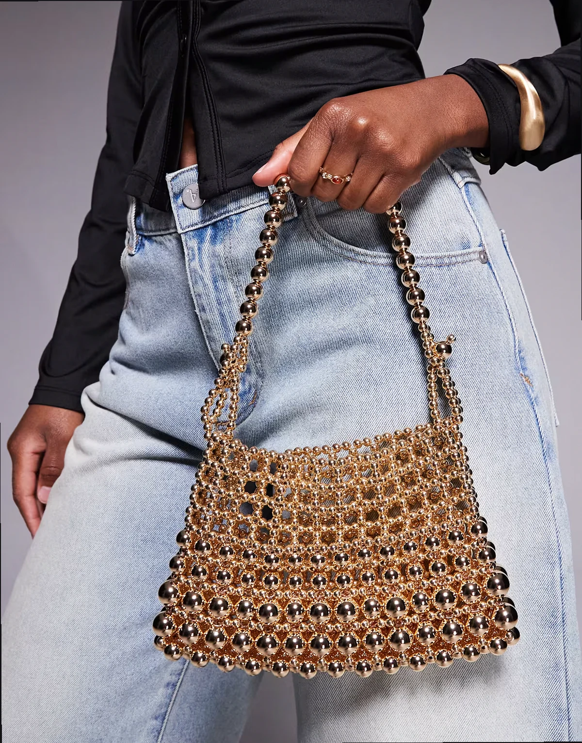 metal beaded adjustable strap clutch bag in gold