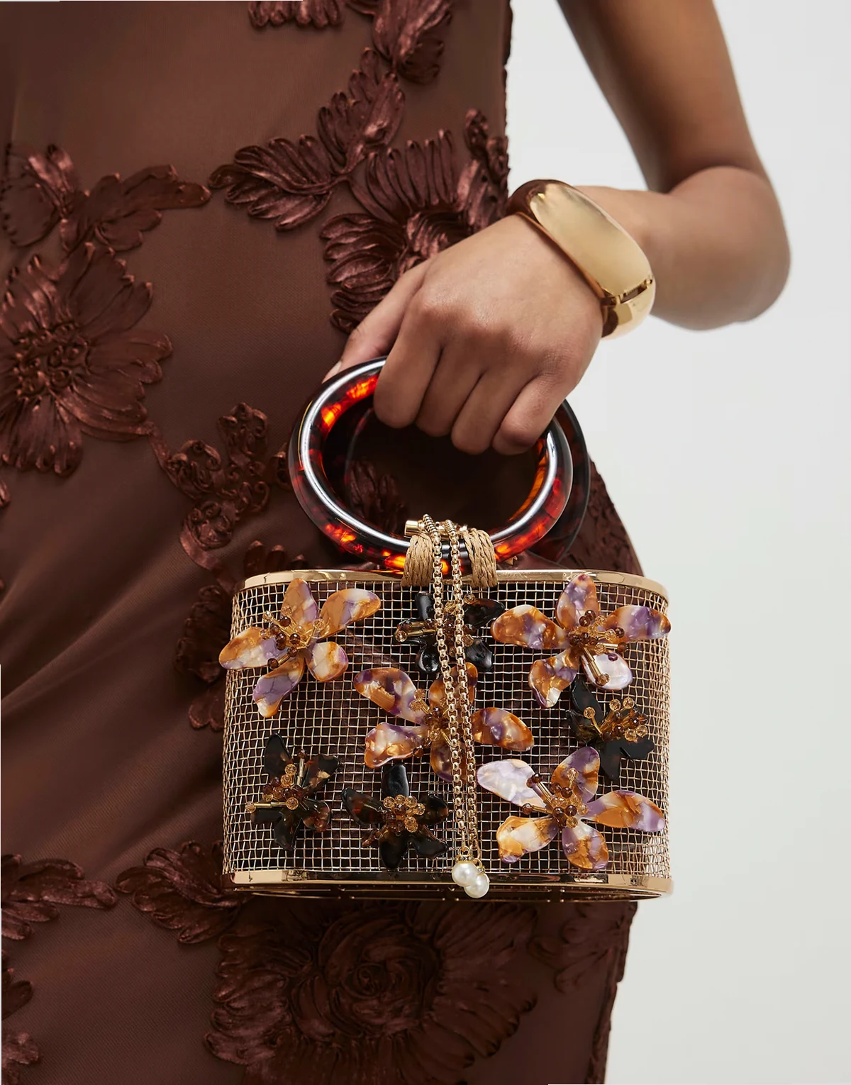 cage bag with floral detail in dark brown