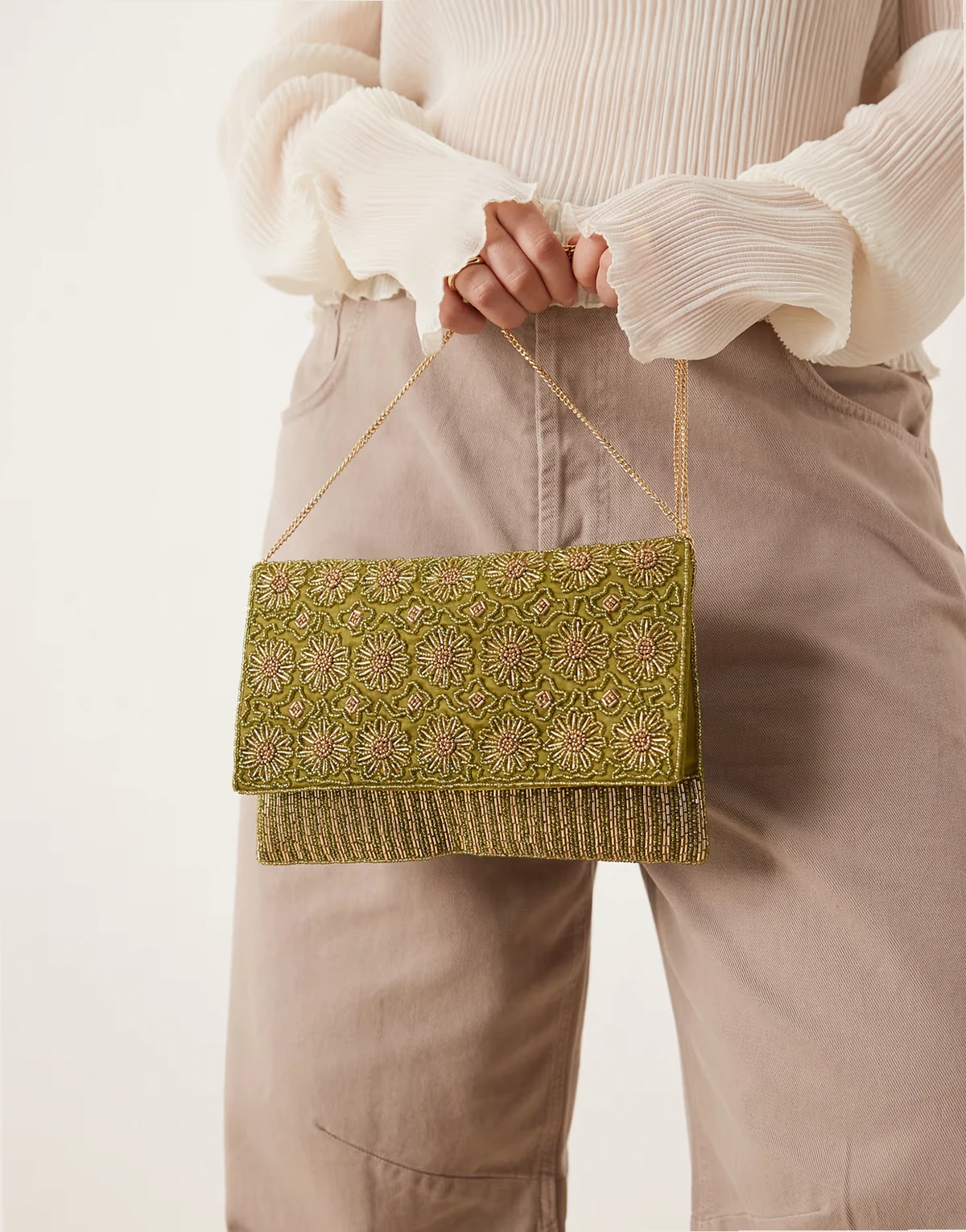 embellished envelope clutch bag in green and gold