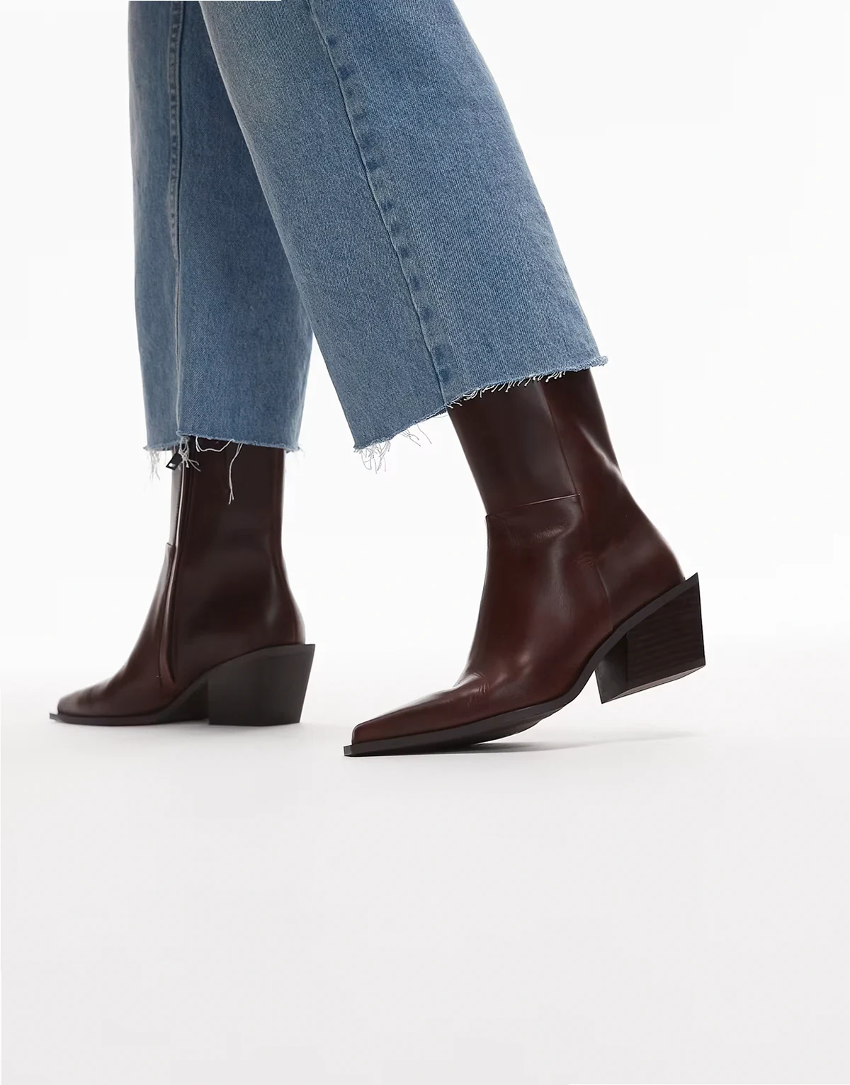 leather pointed heeled boots in brown