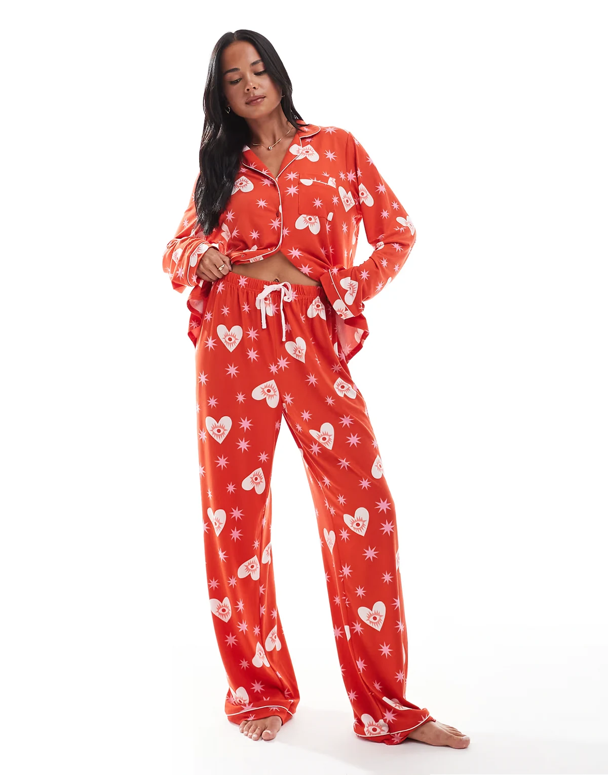 – Pyjama-Set aus superweichem Jersey mit Reverskragen-Oberteil und Hose mit weitem Bein in Rot mit Stern-und-Augen-Print