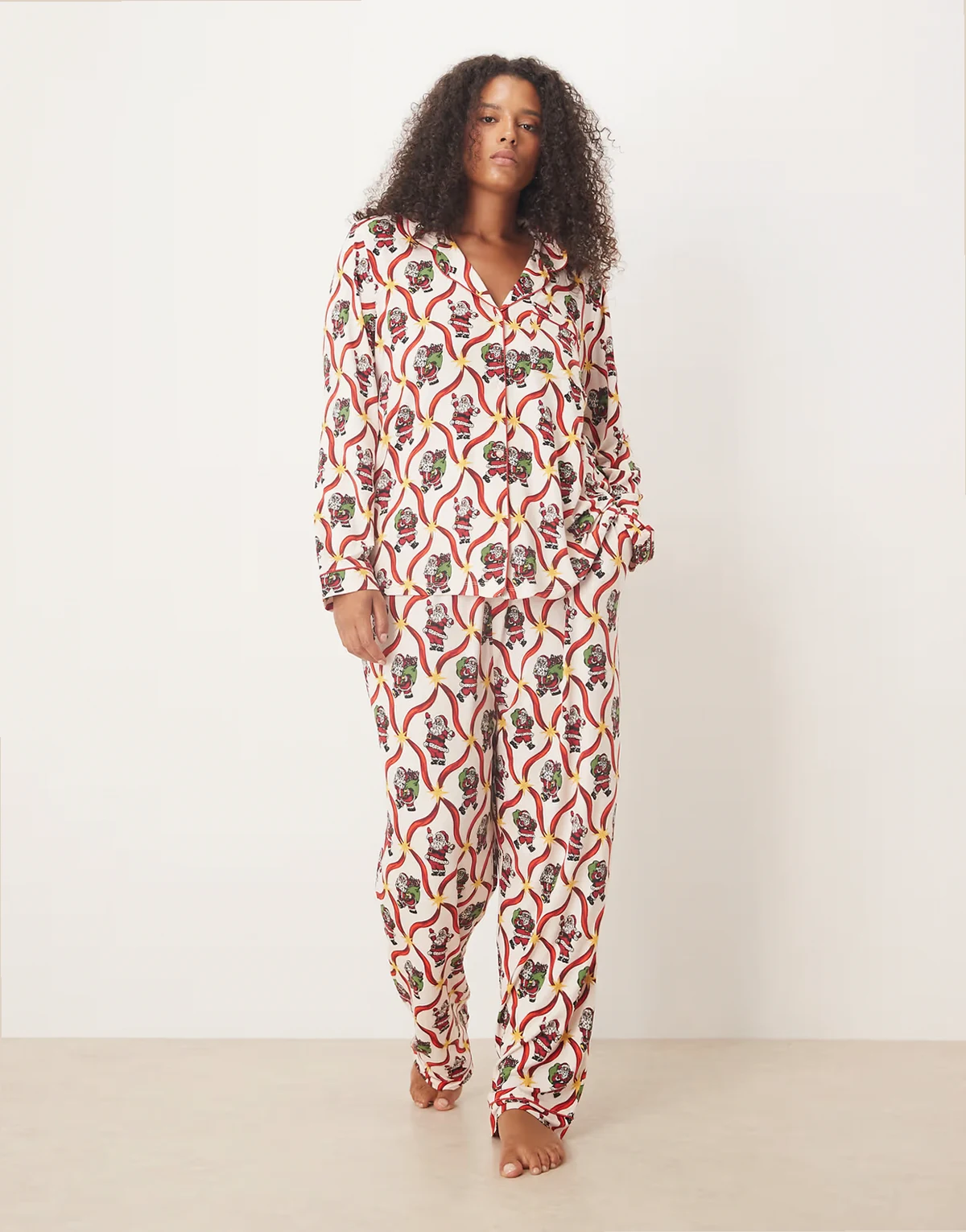 Exclusive Curve poly long sleeve camp collar pajama set in christmas candy cane santa print