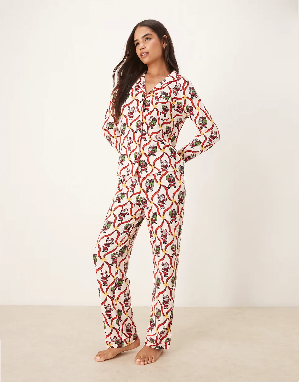 Exclusive poly long sleeve revere pajama set in Christmas candy cane Santa print