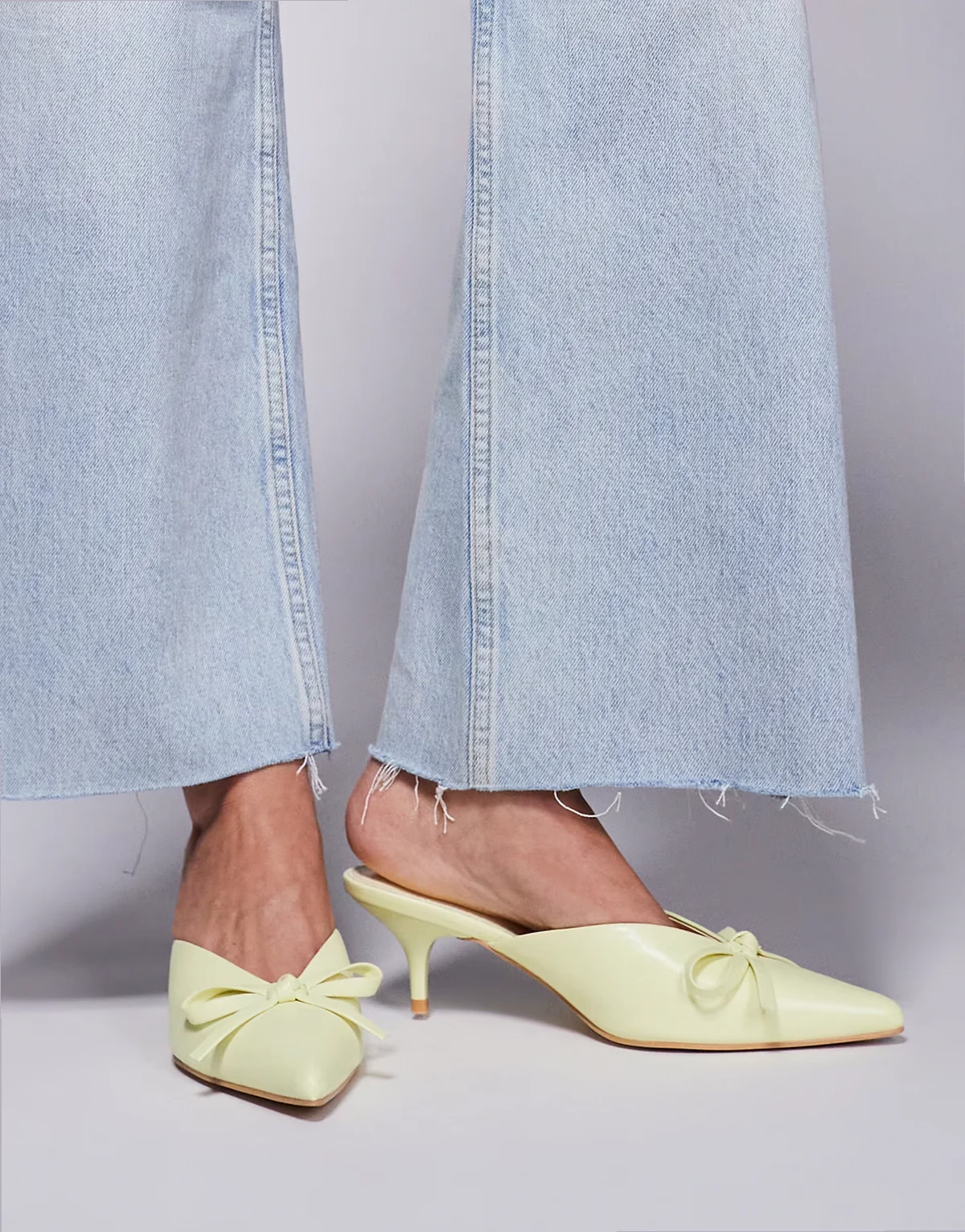 Lionheart pointed kitten heel mules with bow in yellow