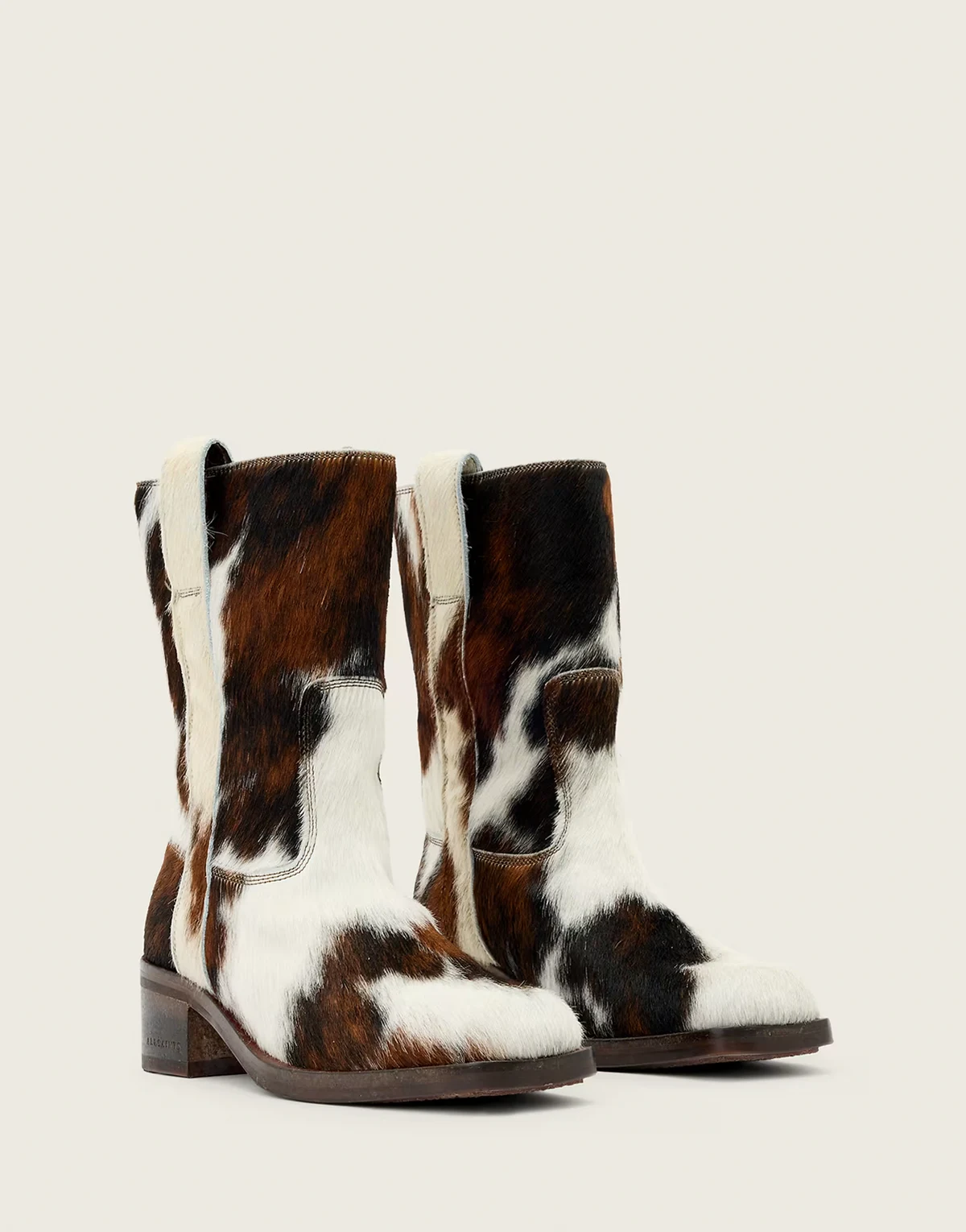 terri cow print mid length boots in cream