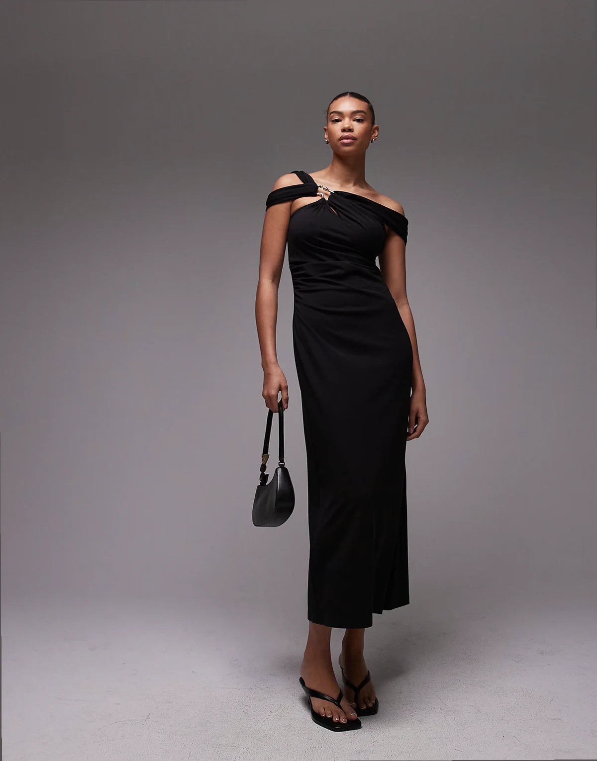 structured jersey midi dress with off-shoulder and metal clasp in black