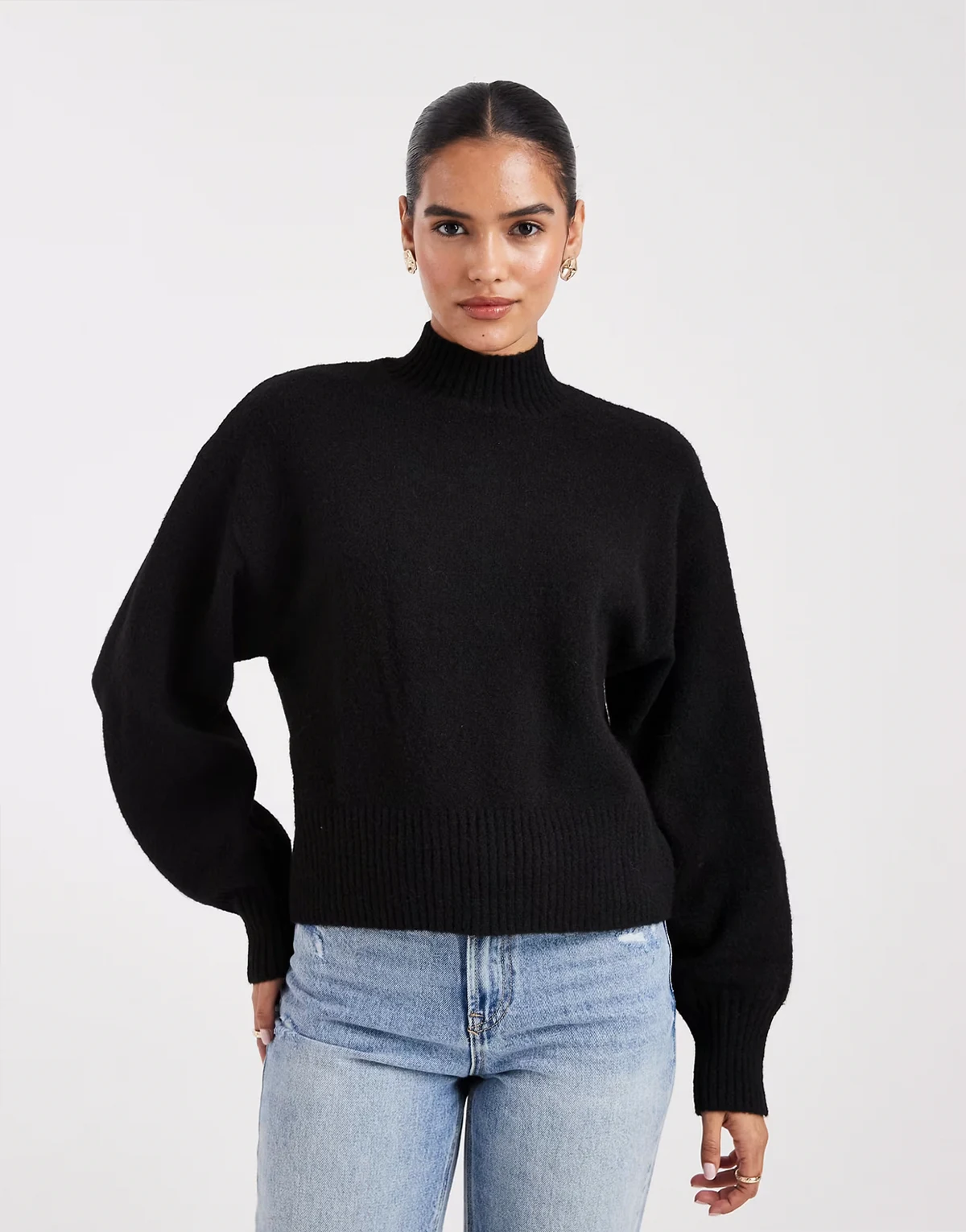 – Strickpullover in Schwarz mit Stehkragen