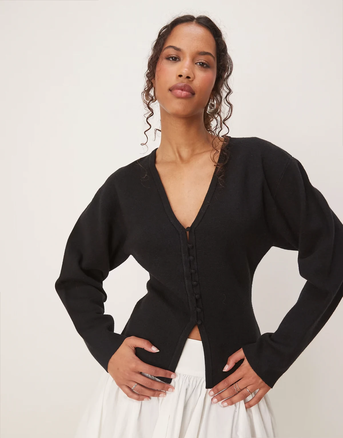 – Kompakte Strickjacke in Schwarz