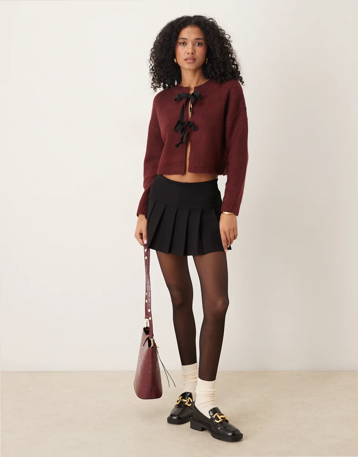 cropped cardigan with black ribbon ties in burgundy