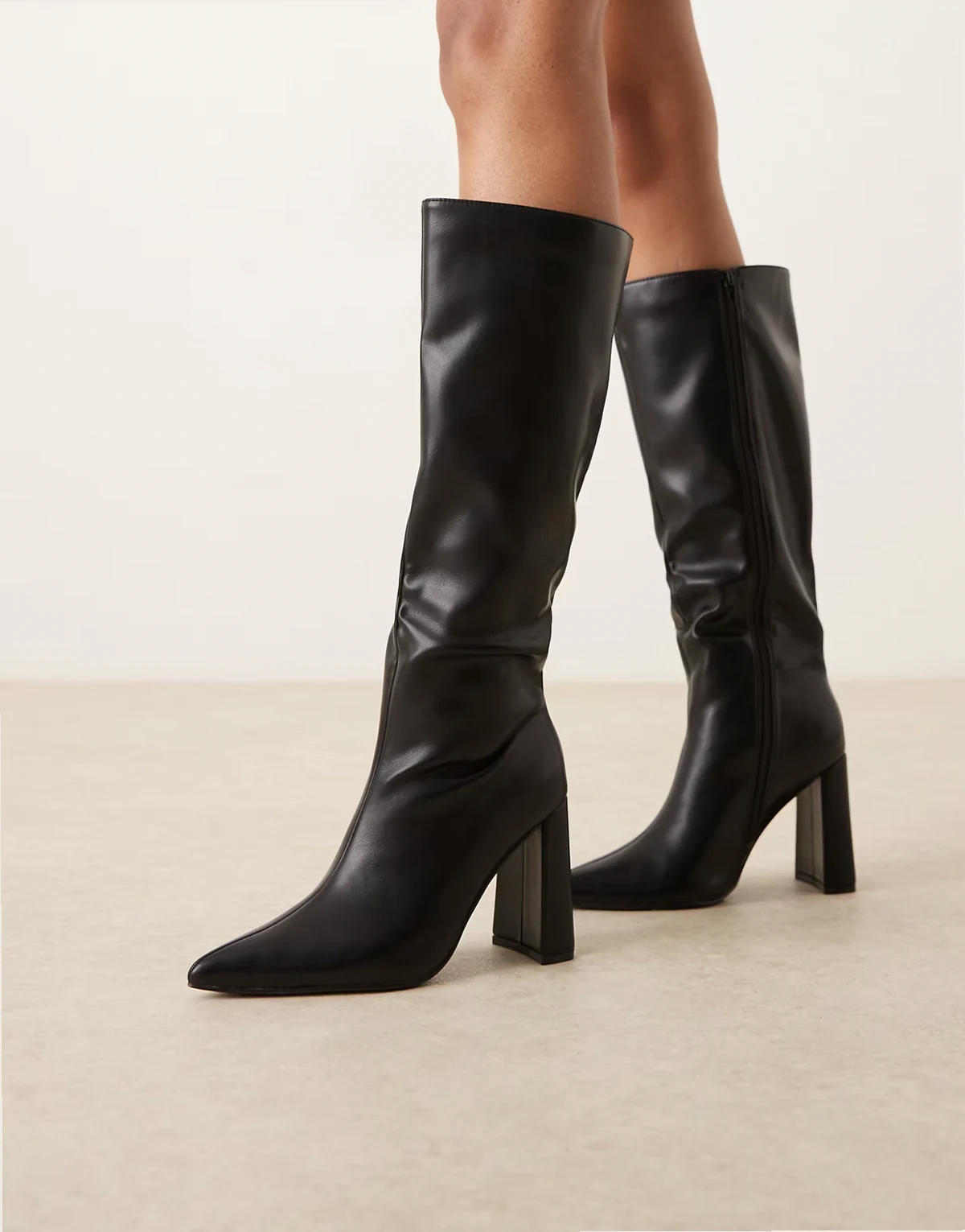 pointed knee boots in black