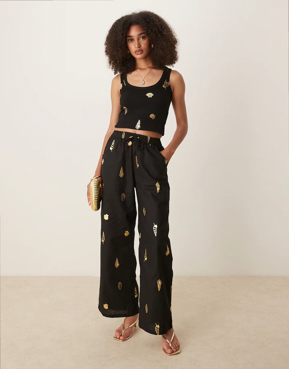 gold shell wide leg pants in black - part of a set