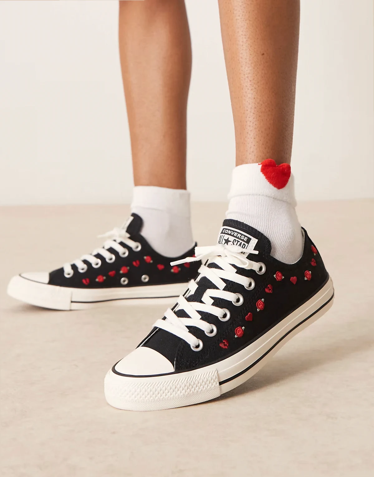 Chuck Taylor All Star sneakers in black with hearts and roses embroidery