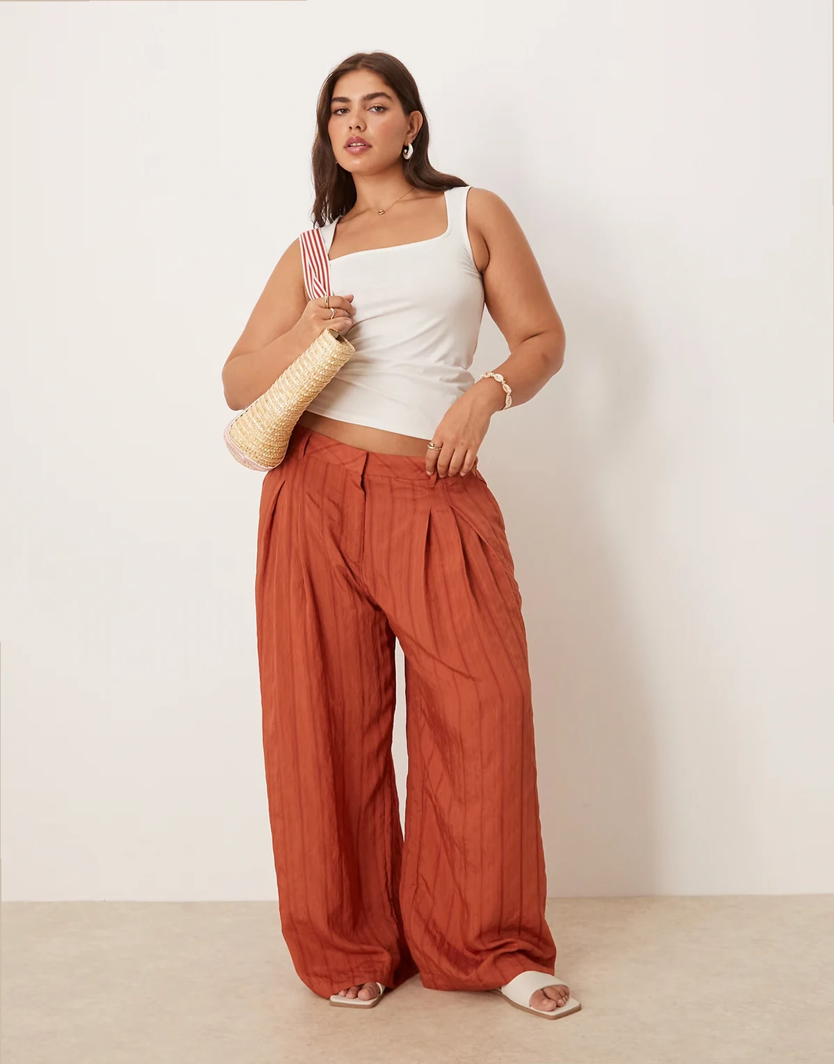 ASOS DESIGN Curve – Rdzawoczerwone spodnie palazzo w paski