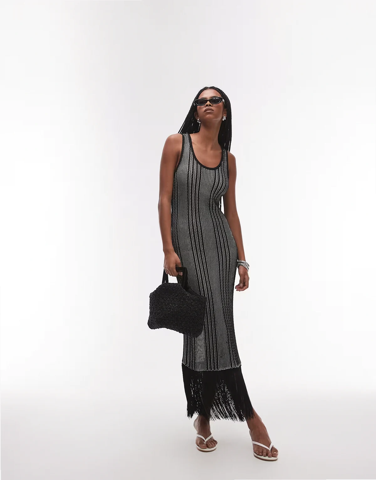 knit midi dress with fringed tassel hem detail in two-tone black