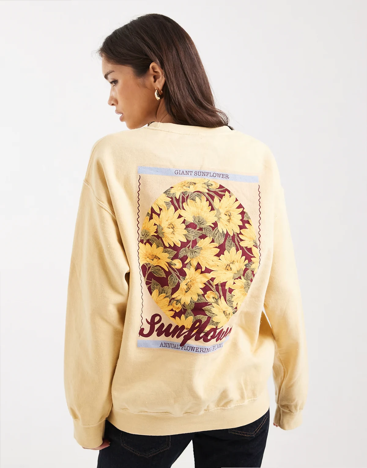 – Oversize-Sweatshirt in Buttermilch mit Sonnenblumen-Grafikprint