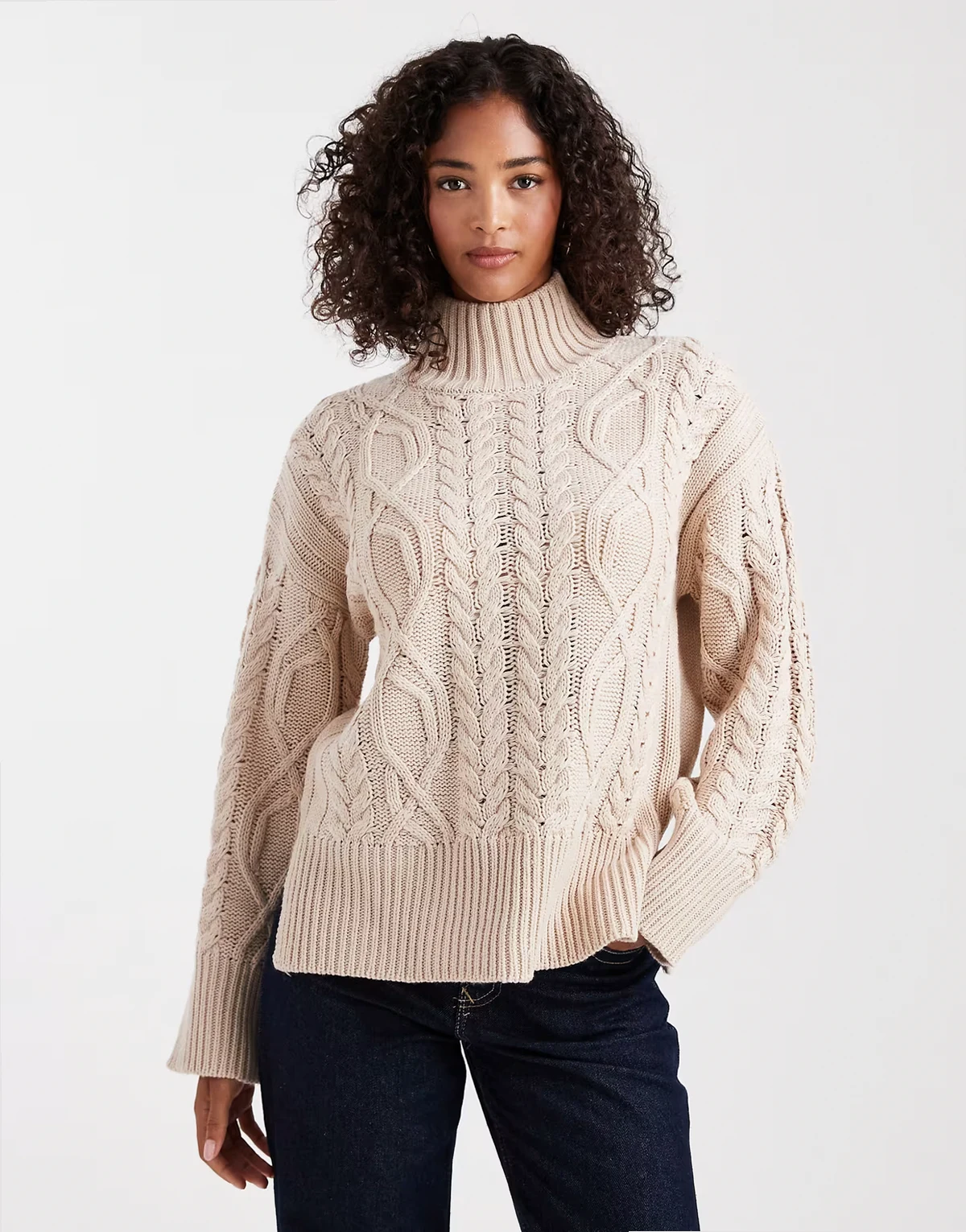 chunky cable knit high neck sweater in stone