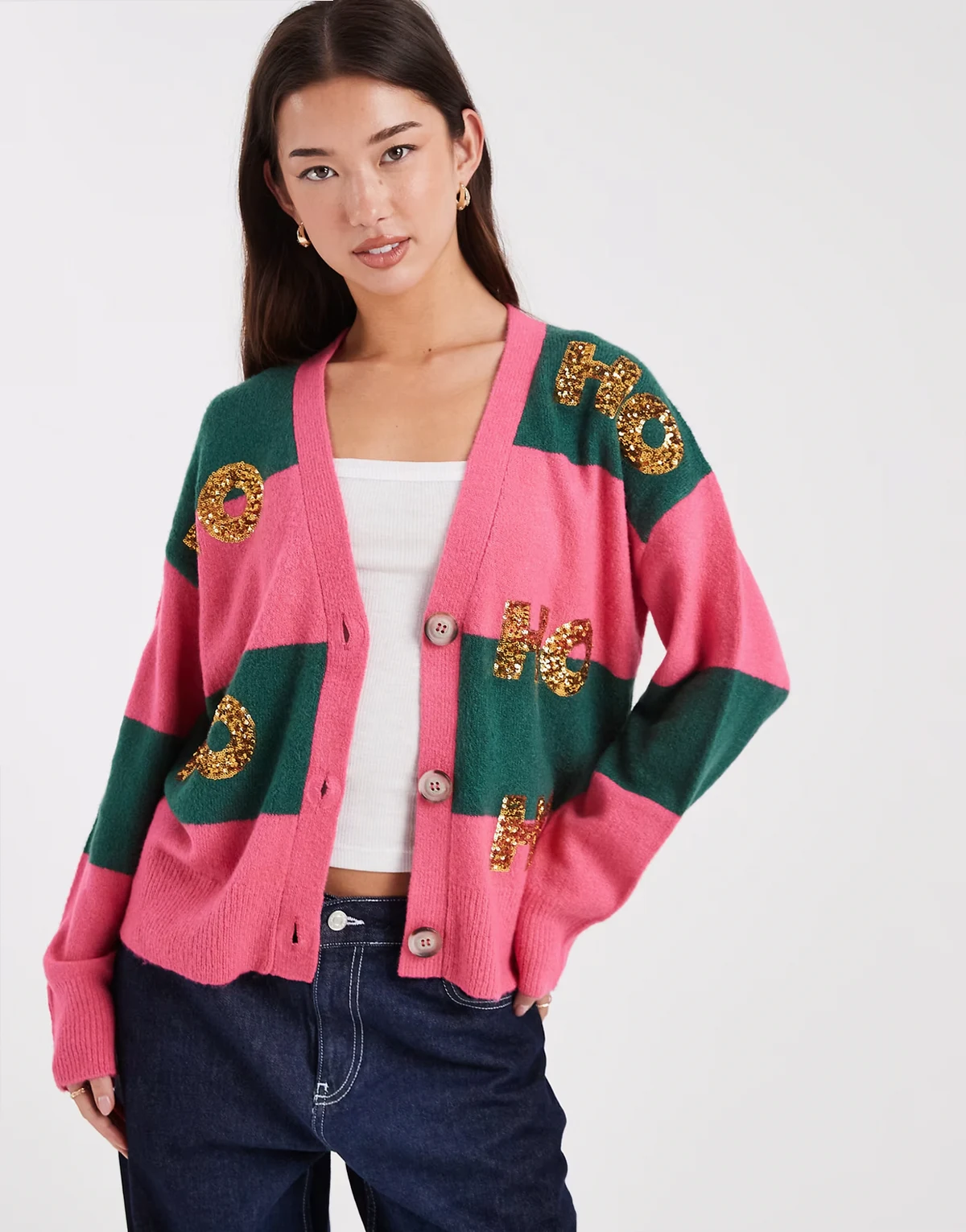 Christmas striped cardigan with sequin detailing in pink and green