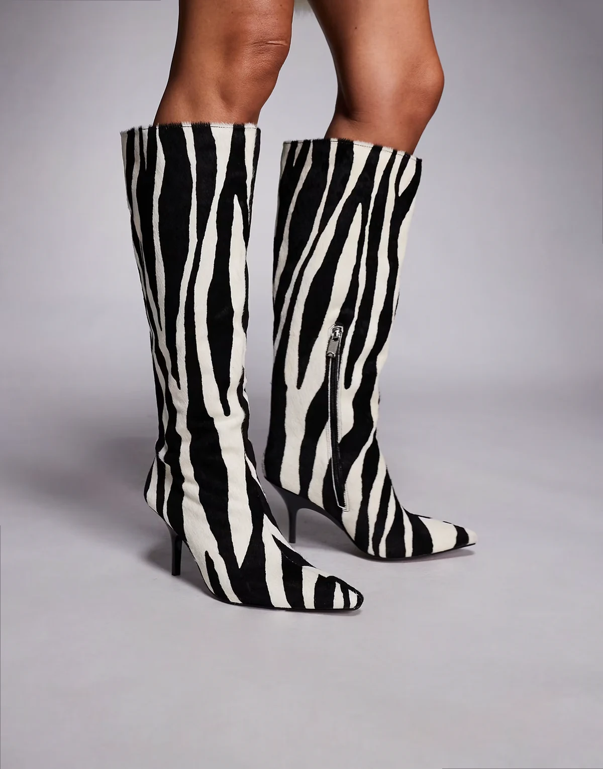 knee high boots in zebra leather 'hair on' in black