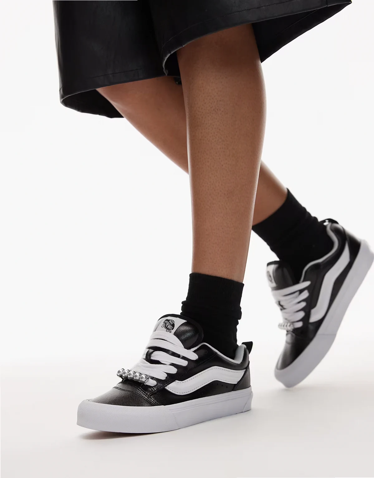Knu Skool leather sneakers in metallic black
