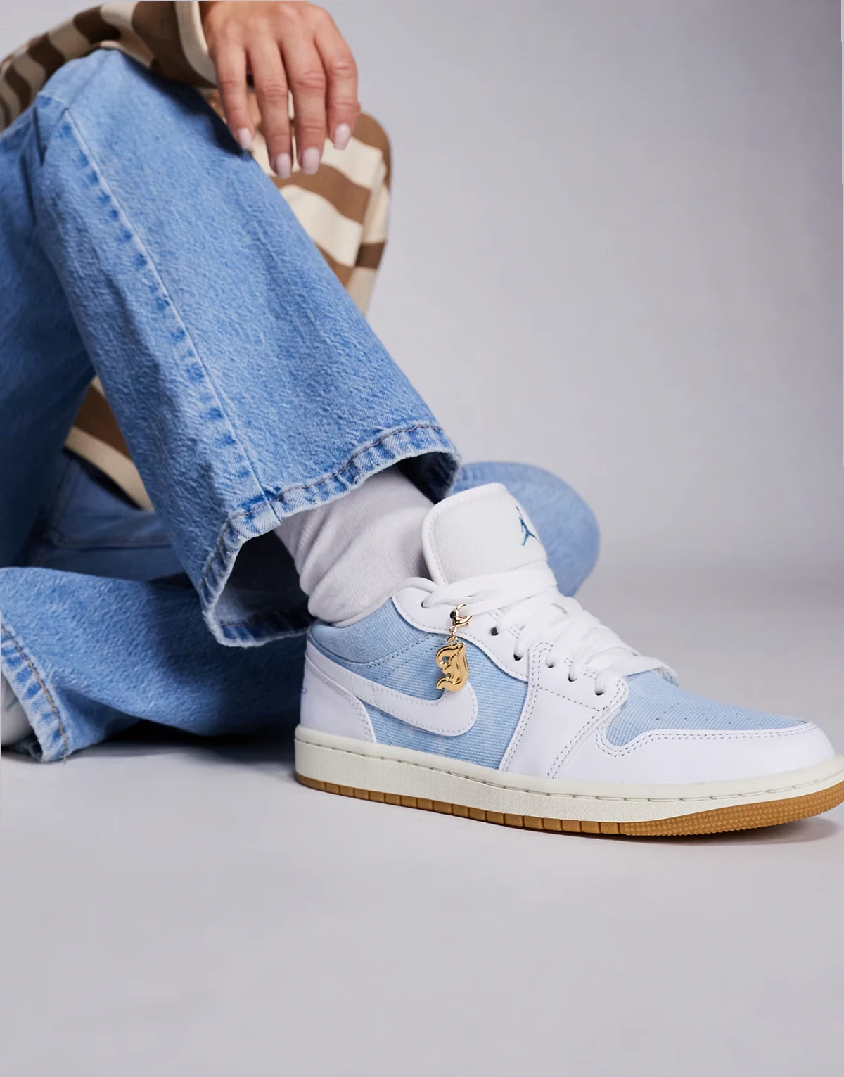 Nike Air Jordan 1 Low sneakers in light blue and white