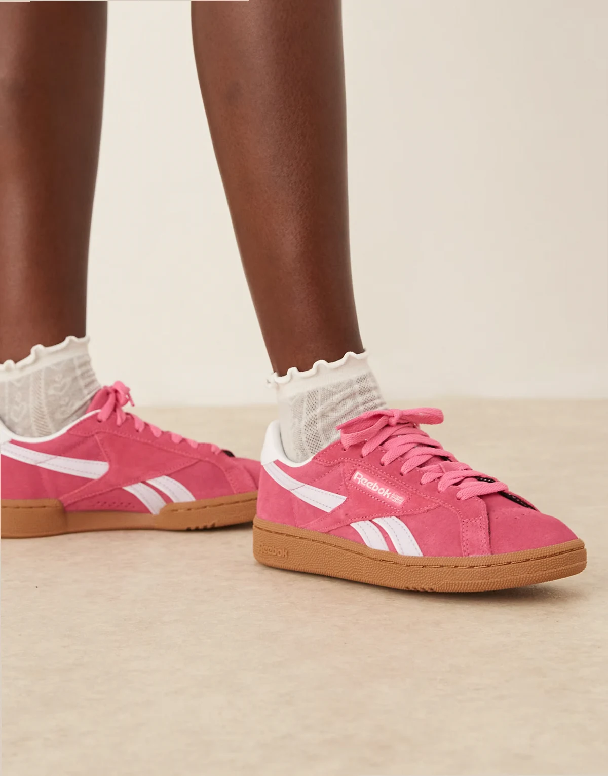 Club C Grounds sneakers in pink and white detail with rubber sole