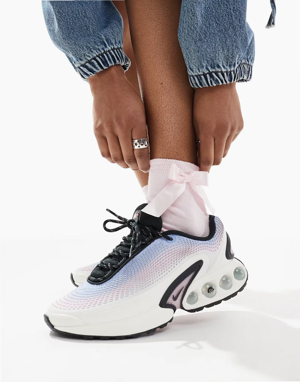Air Max DN sneakers in white and pink