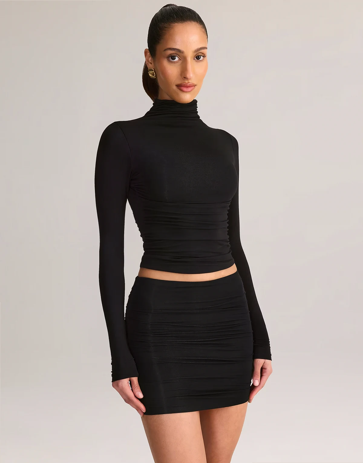 jersey ruched mid rise mini skirt in black - part of a set