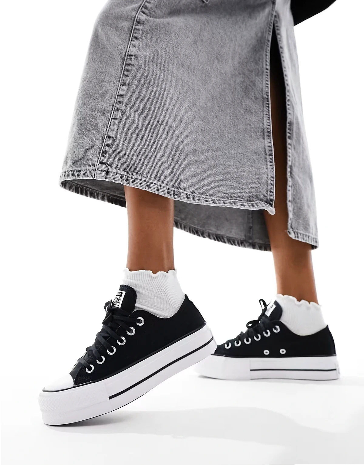 Chuck Taylor All Star Hi Lift canvas sneakers in black and white