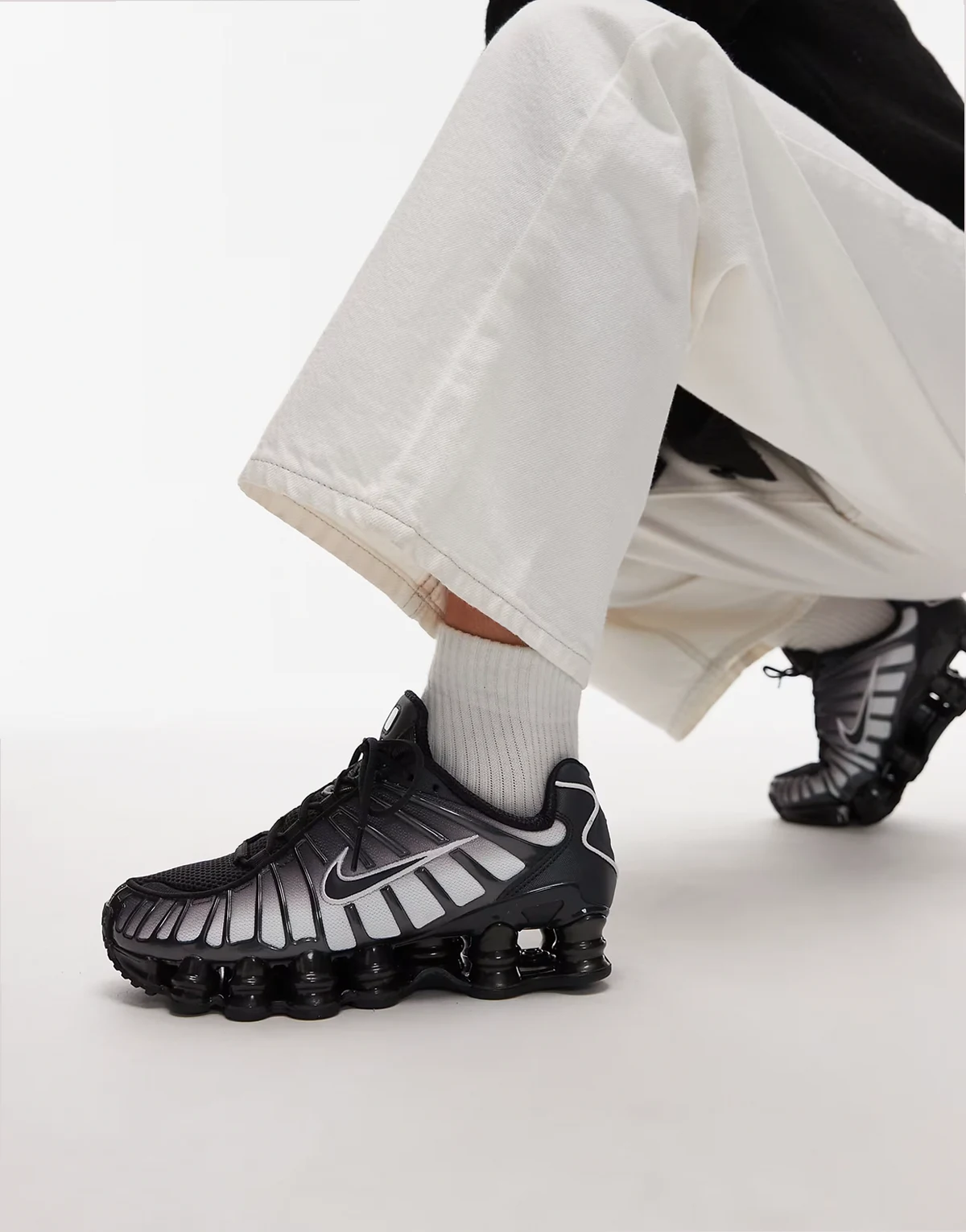 Shox TL sneakers in black and gray