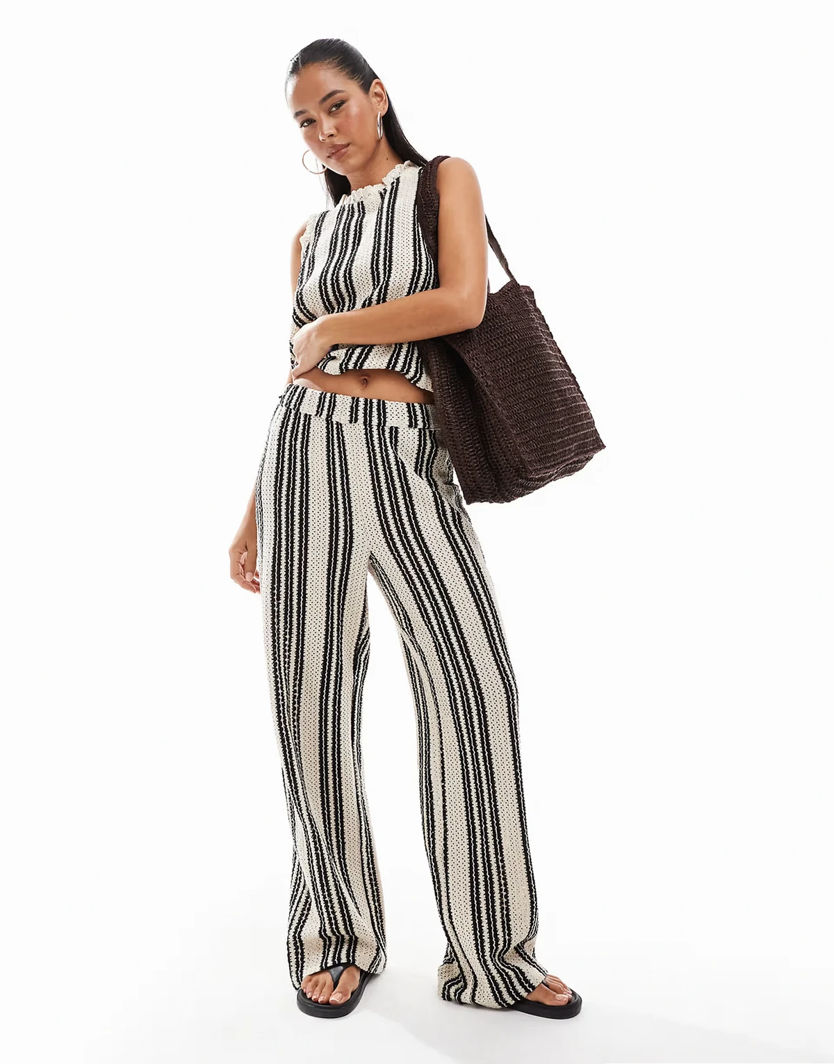 open knit wide leg pants in black and white stripes - part of a set