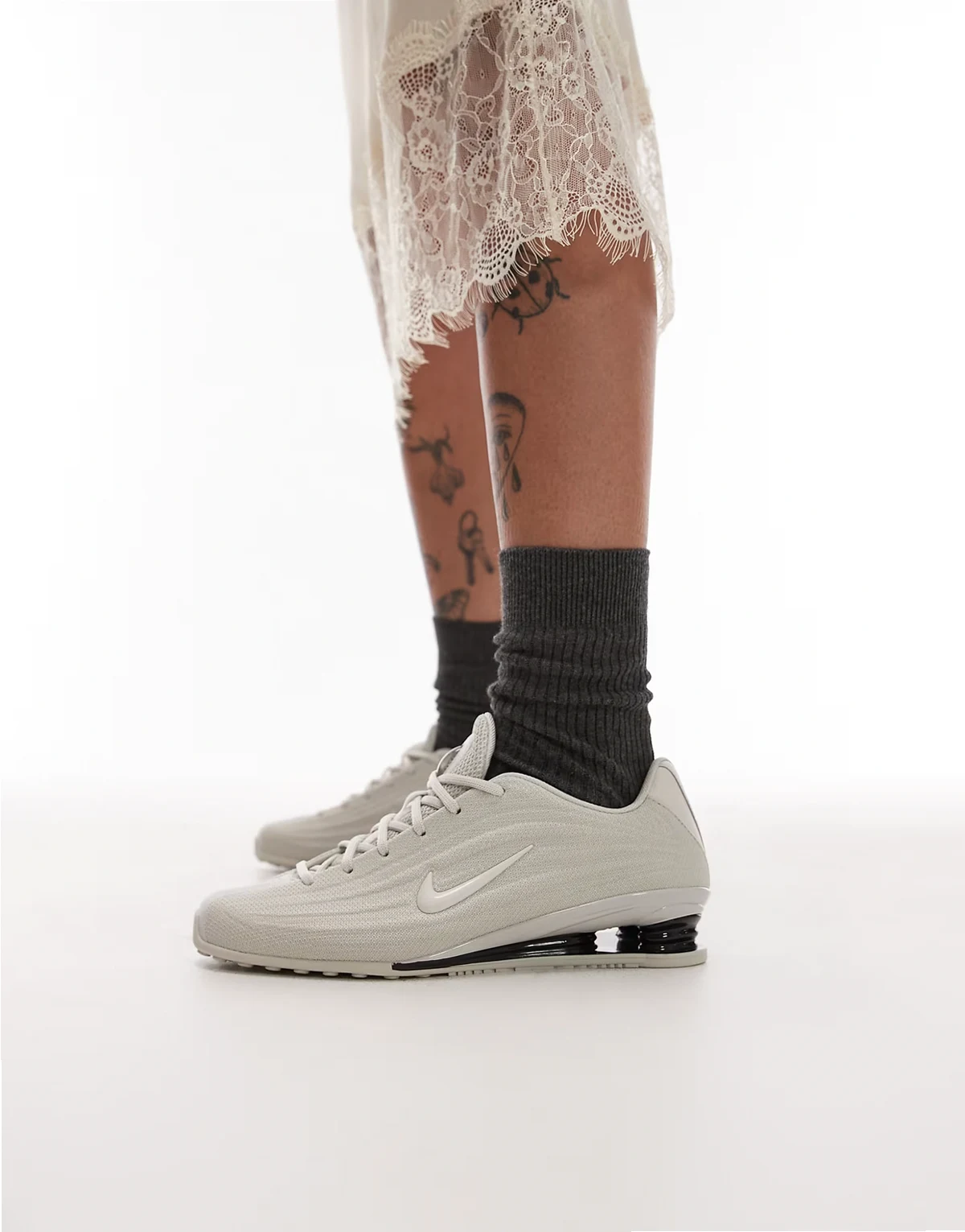 Shox Z sneakers in beige and black