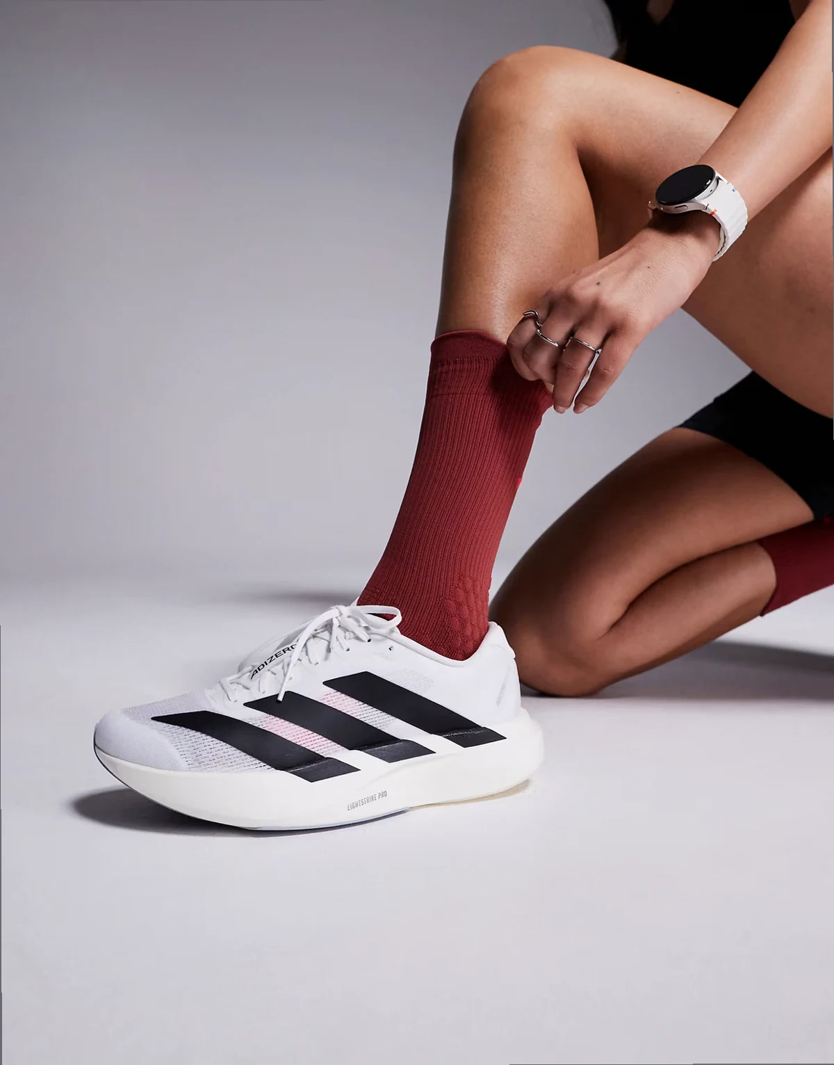adidas Running Adizero Evo SL sneakers in white and black