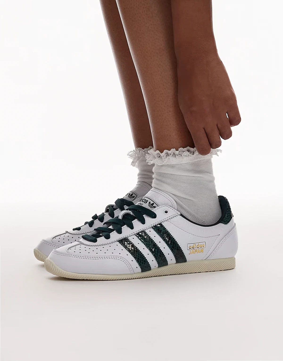 Japan sneakers in white with dark green snake print detailing