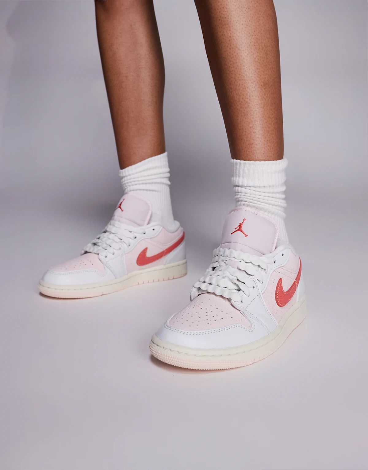 Nike Air Jordan 1 Low SE sneakers in off white and pink