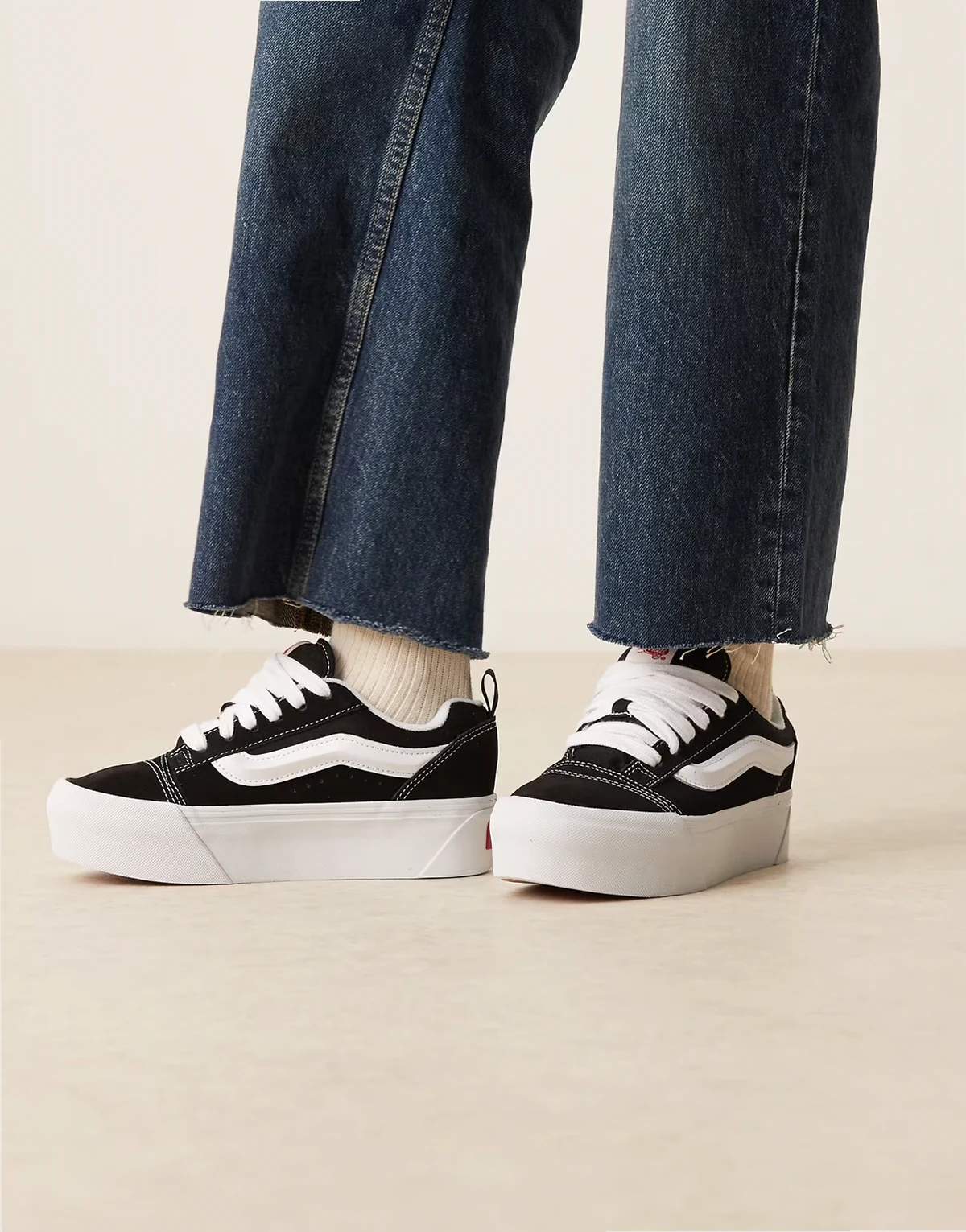 Knu Stack sneakers in black and white