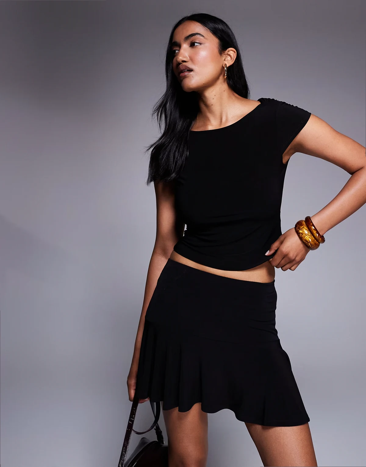 slinky flippy mini skirt in black - part of a set