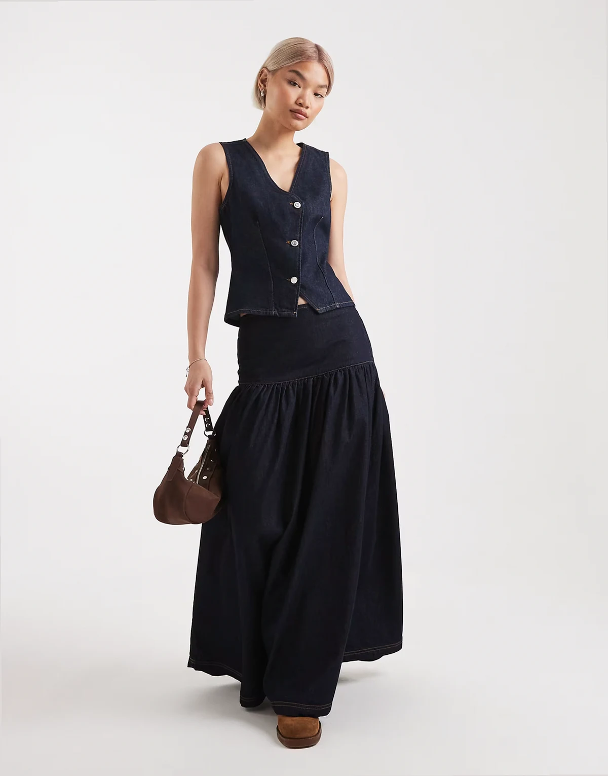 dropped waist denim maxi skirt in indigo