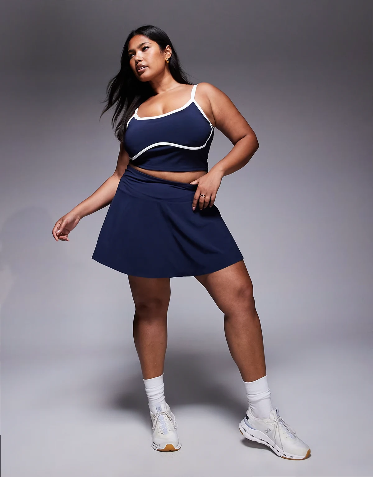 Curve tennis flippy skirt with inner shorts in deep navy