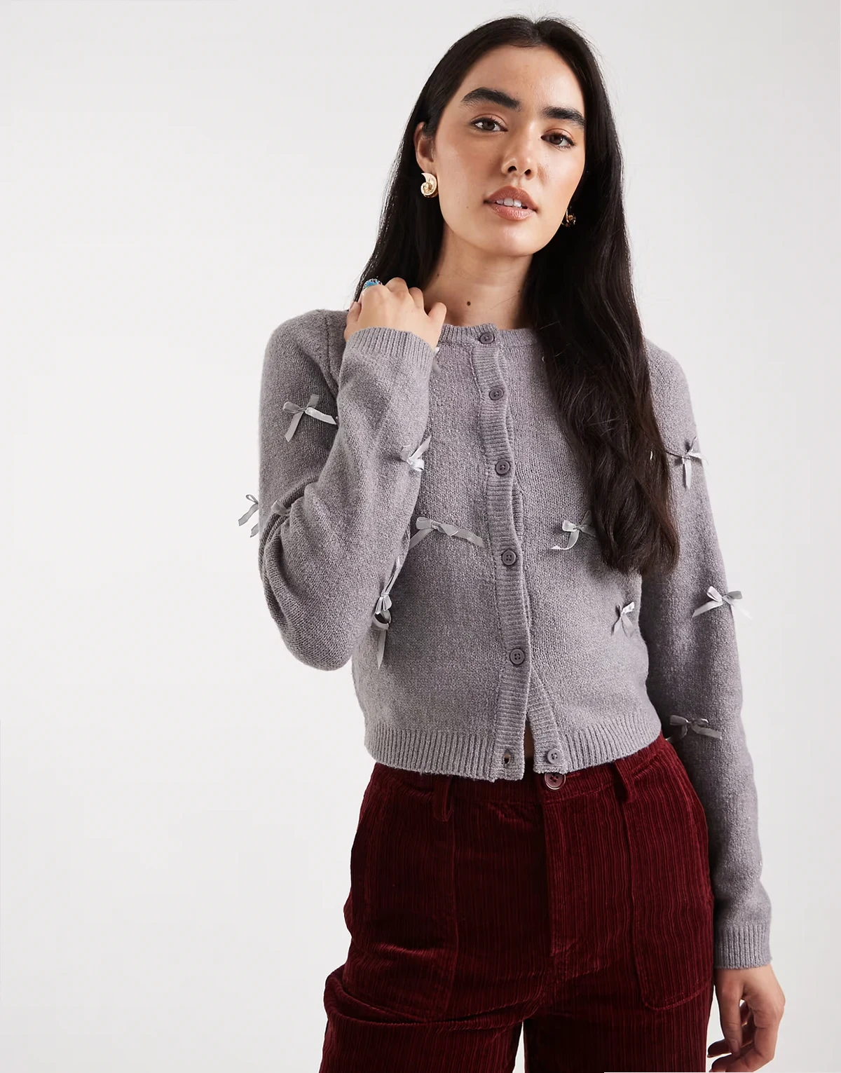 cardigan with all over ribbon bow detail in gray