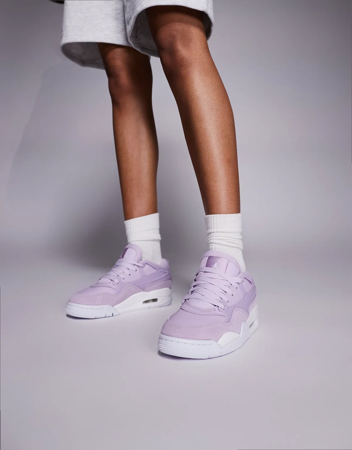 Nike Air Jordan 4 RM sneakers in purple and white
