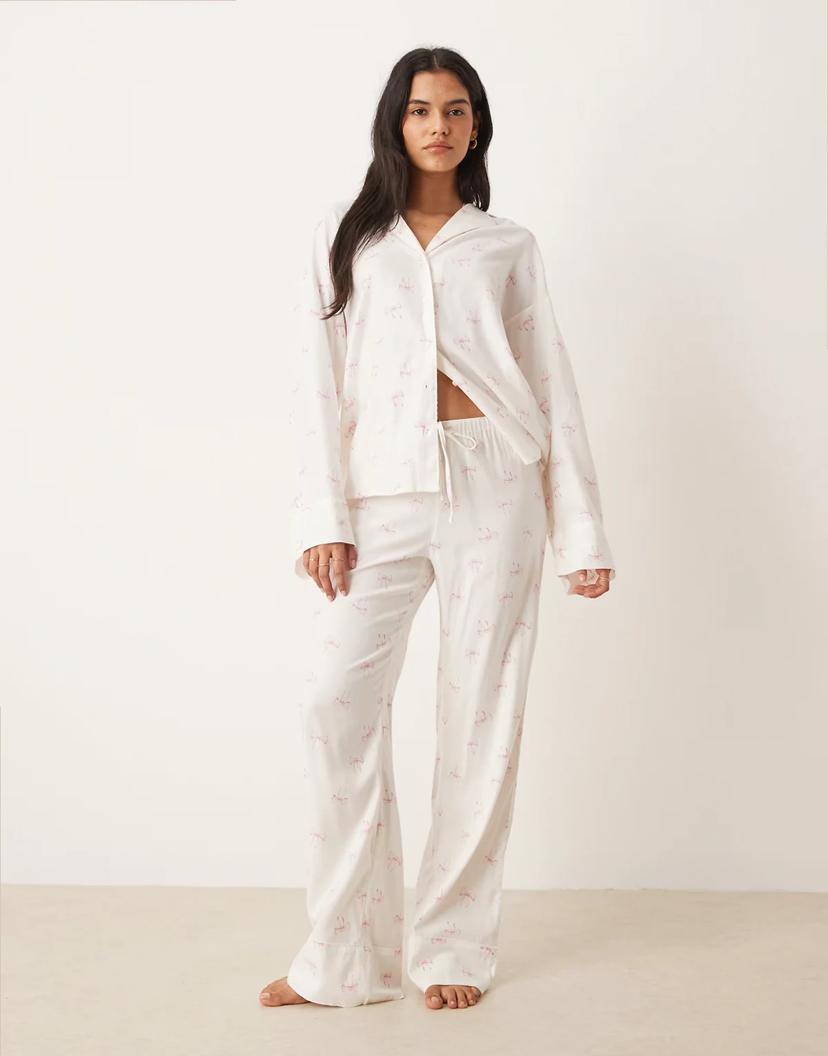 mix and match flannel pajama pants in white with pink bows print