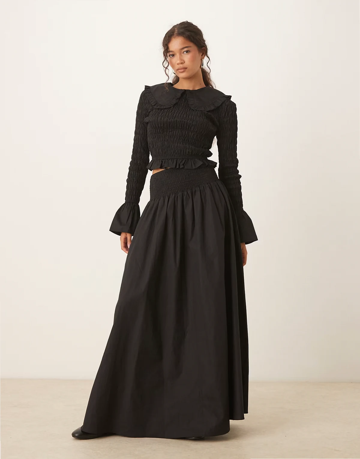 dropped waist shirred maxi skirt in black - part of a set