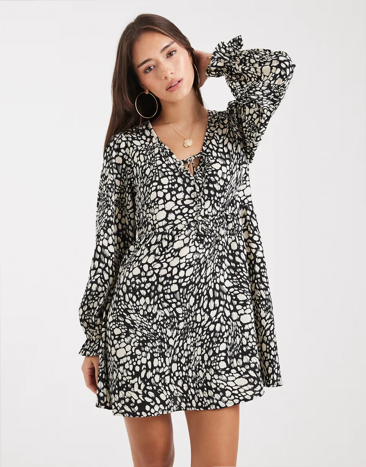v neck floaty abstract print mini dress in black