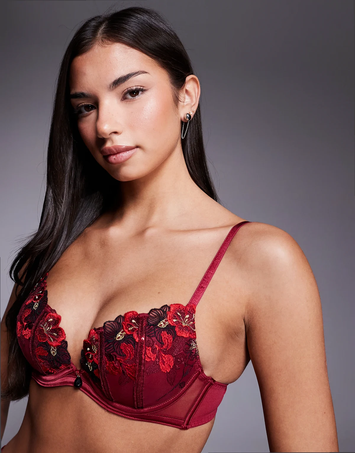 Shimmering padded plunge bra in red/pink