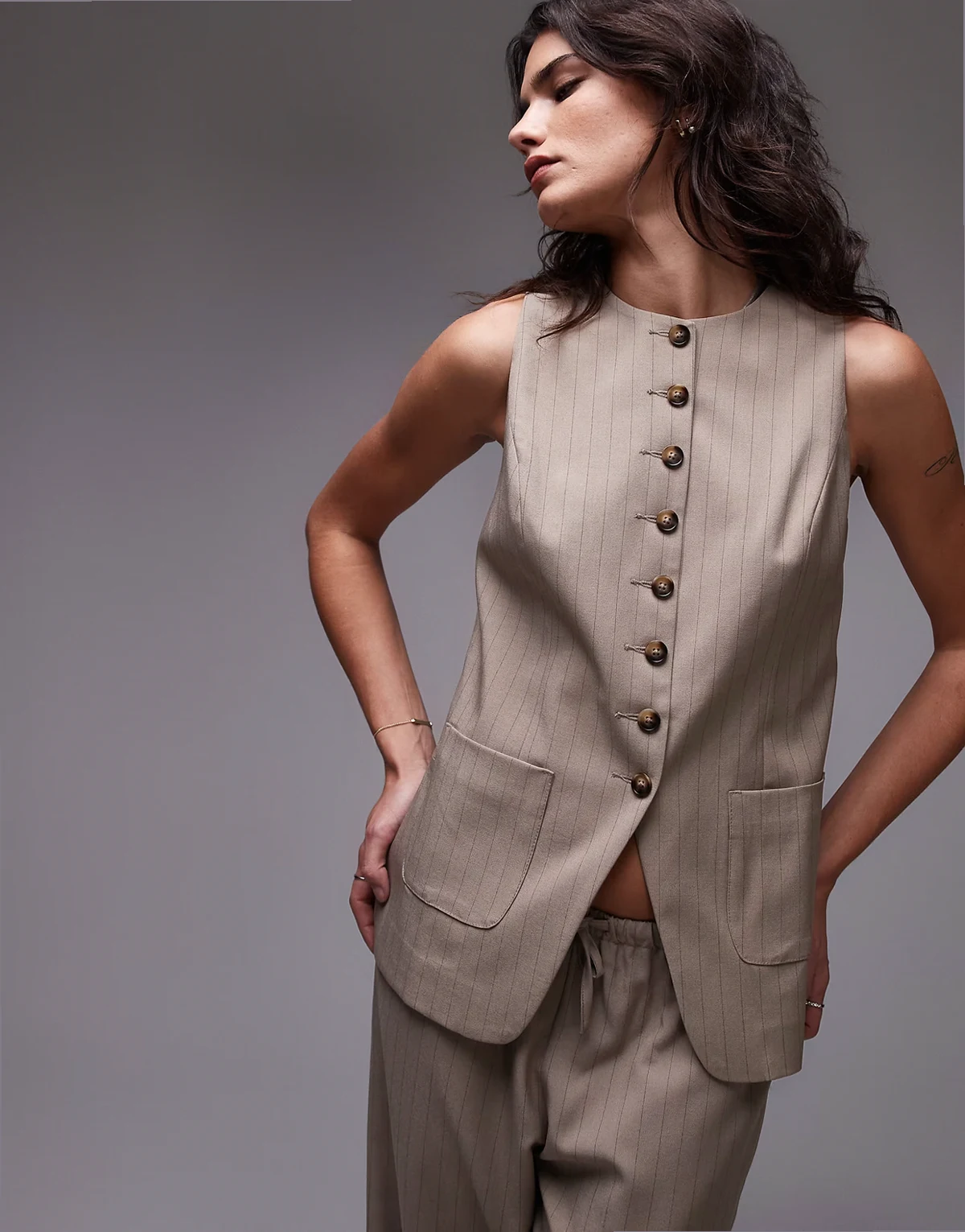 high neck vest with pockets in pinstripe taupe