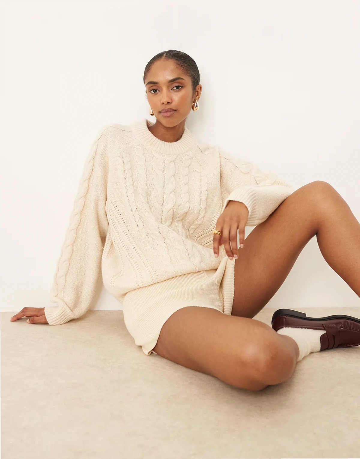cable knit sweater in cream