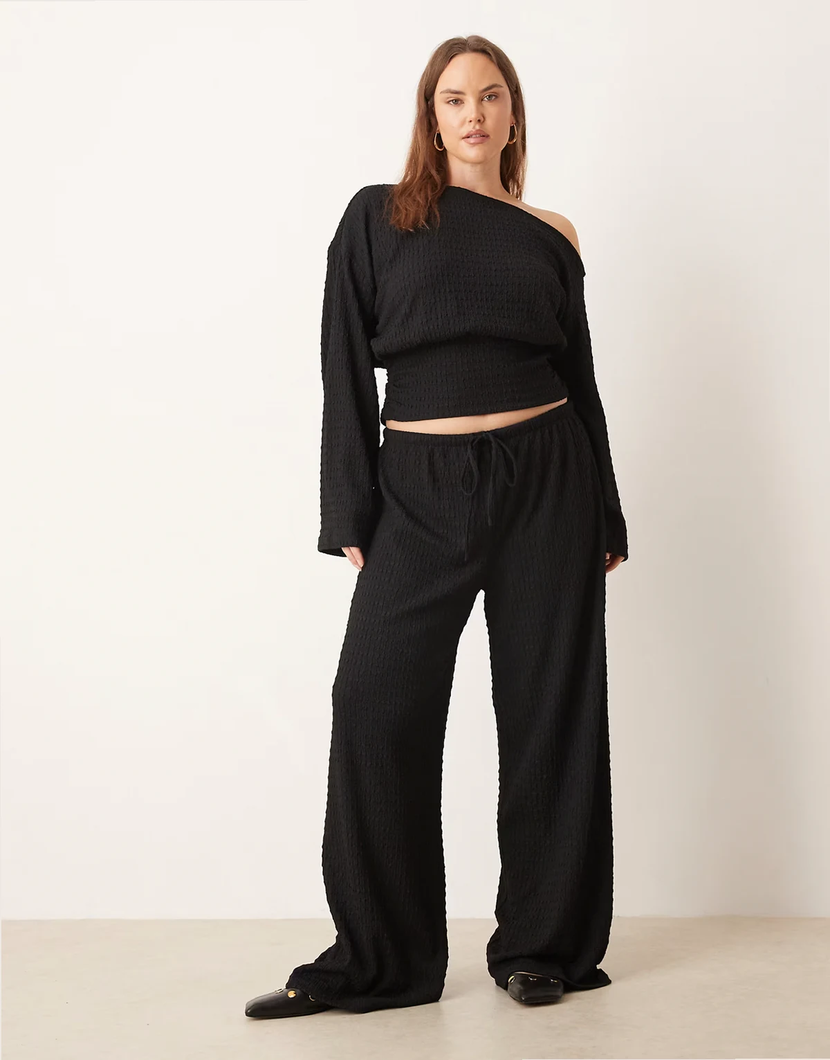 ASOS DESIGN Curve textured tie waist wide leg pants in black - part of a set