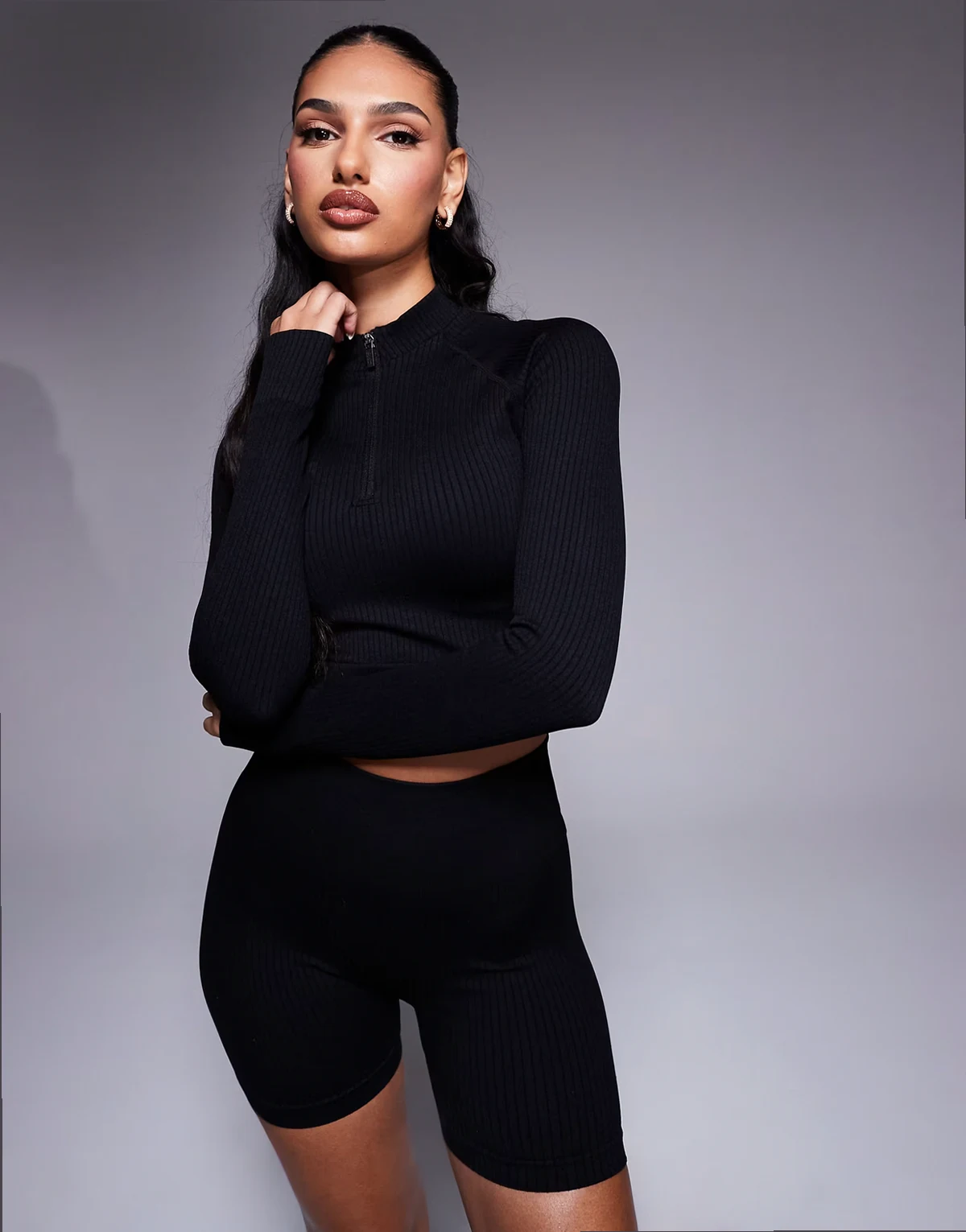 Icon seamless rib knit 1/4 zip long sleeve top in black