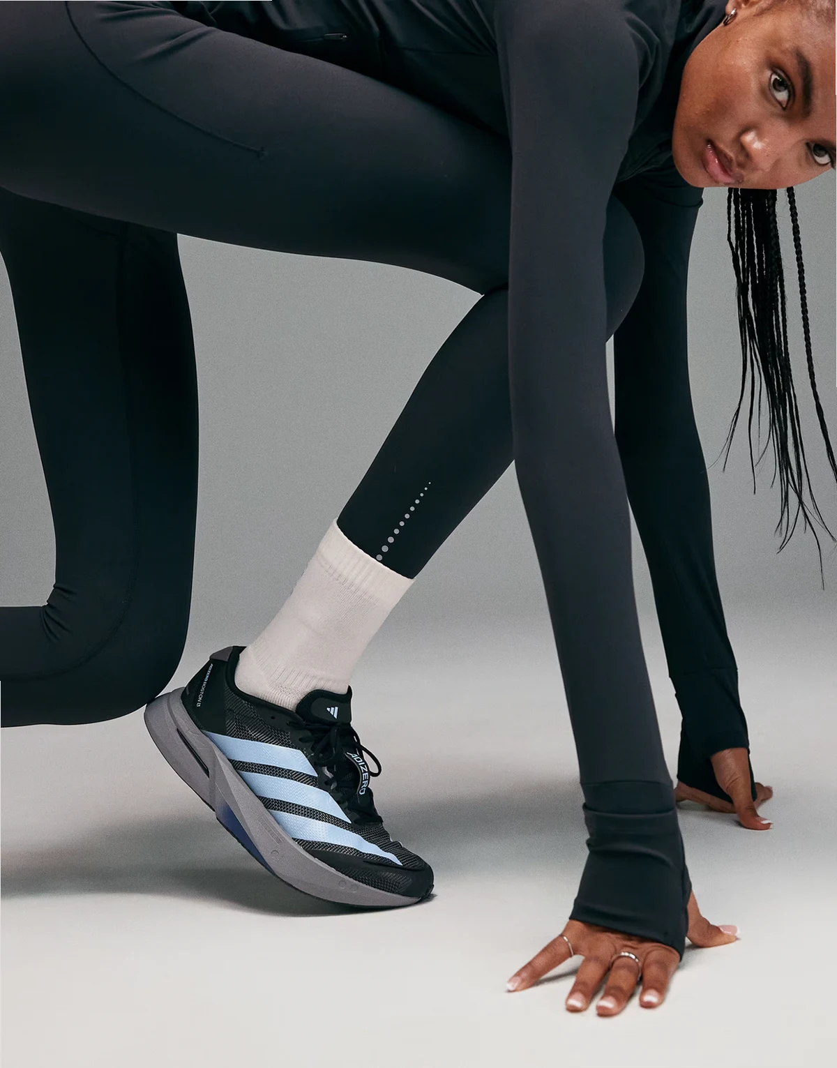 Premium reflective high waisted running leggings with phone pockets and bonded seams in void black